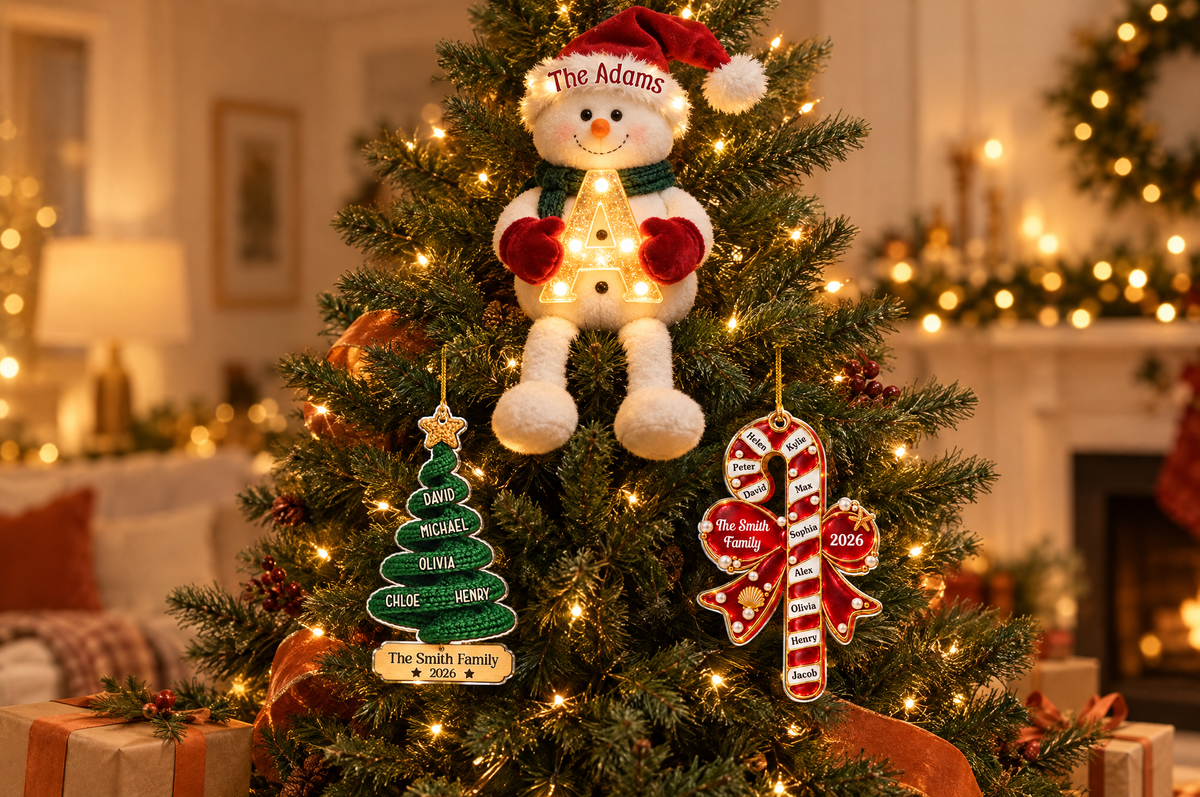 A glowing Christmas tree with personalized family ornaments and a snowman tree topper